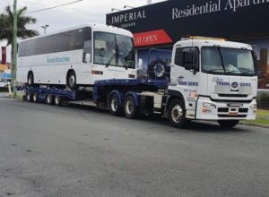 Truck Towing a Bus — Tow Truck Provider in the Gold Coast