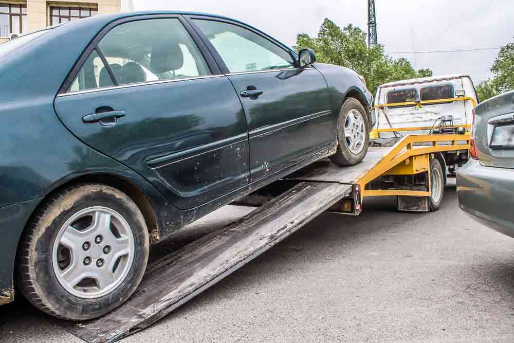 Tow Truck Loading A Car