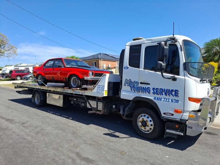 Towing A Red Car