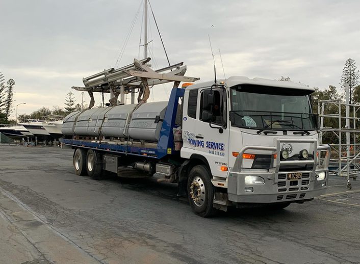 Tow Truck With Cargo on The Back — Tow Truck Provider in the Gold Coast
