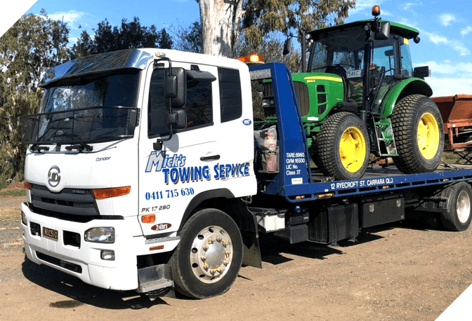 Tow Truck Nissan UD Pk17 Tilt Tray by Mick's Towing Service