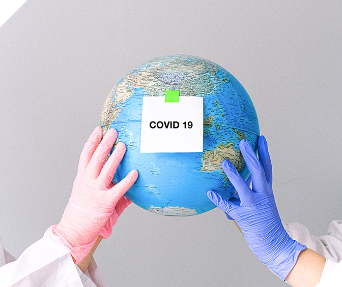World Globe With COVID-19 Sticker — Tow Truck Provider in the Gold Coast