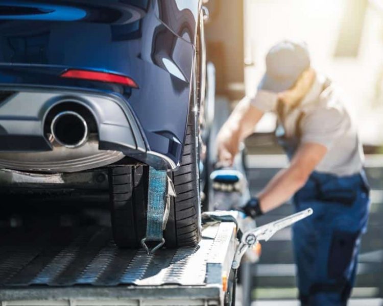 Towing A Blue Car
